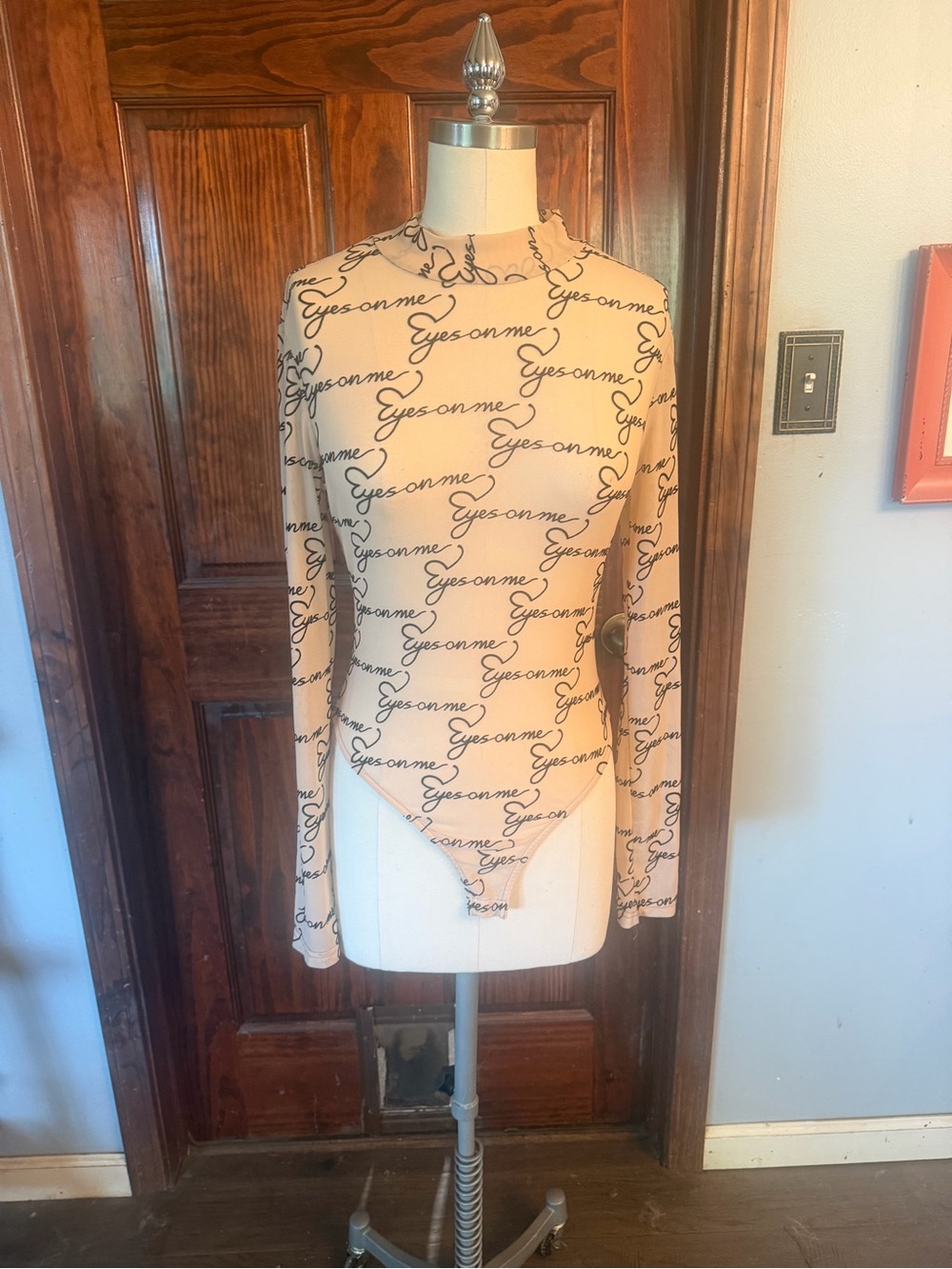 AKIRA Beige Long-Sleeve Script-Print Bodysuit